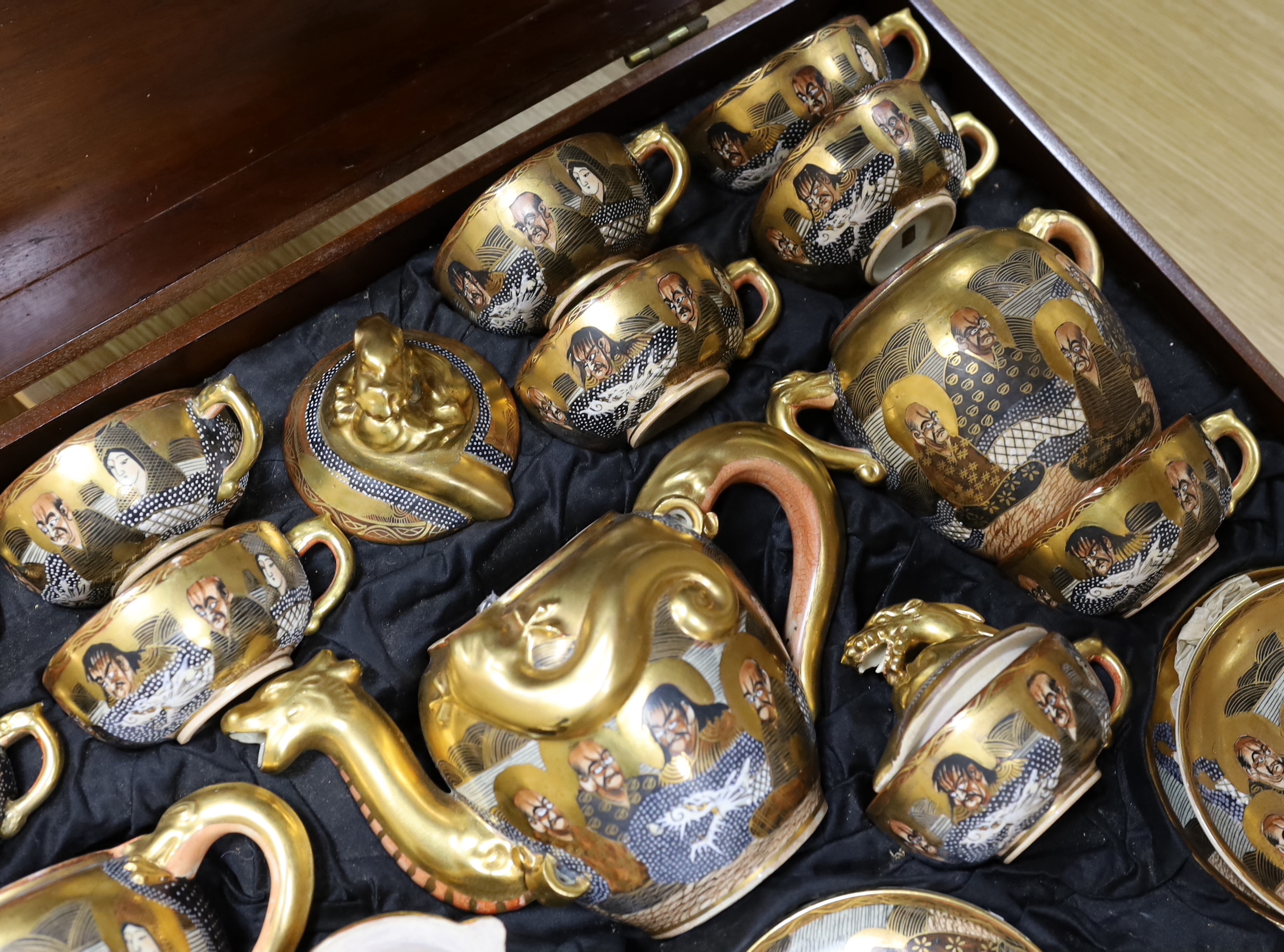 A large mahogany cased set of early 20th century Satsuma teaware